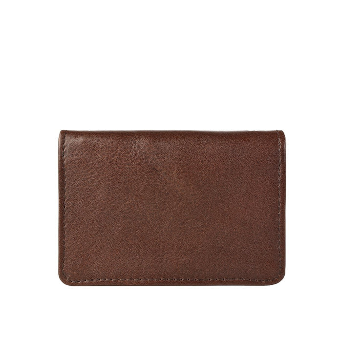 Brown leather card holder, plain front panel, soft texture, & clean stitches on a white background.